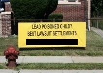 This is a photograph of a sign put out by an attorney claiming that they can get the best lawsuits settlements for a lead poisoned child. This is why it is very important for property owners to get a Lead Based Paint Certification for their rental properties.
